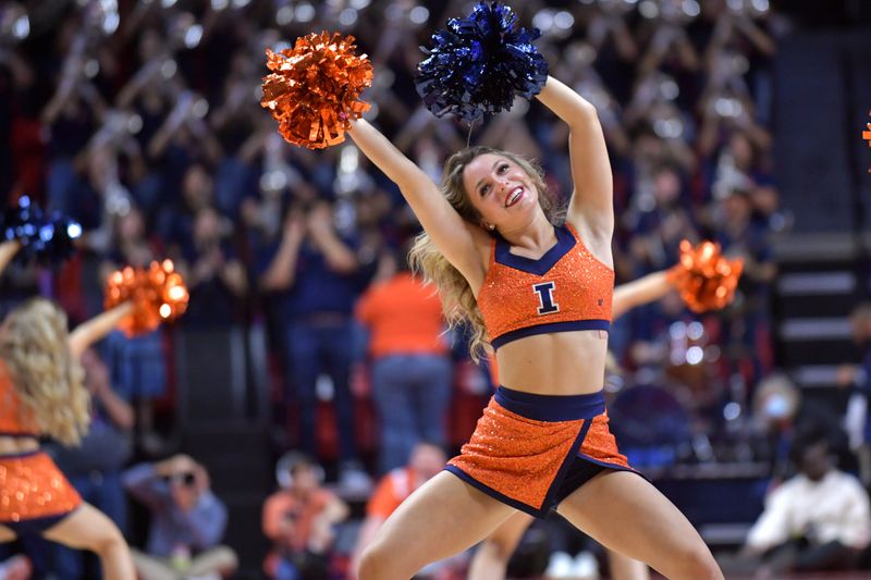 Nov 17, 2023; Champaign, Illinois, USA; The Illinois Fighting Illini cheer team performs during the second half at State Farm Center. Mandatory Credit: Ron Johnson-USA TODAY Sports