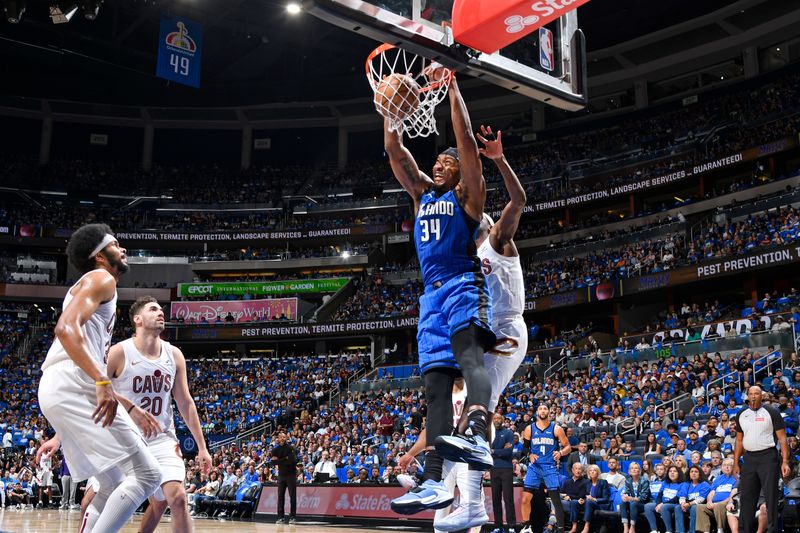 ORLANDO, FL - APRIL 27: Wendell Carter Jr. #34 of the Orlando Magic dunks the ball during the game against the Cleveland Cavaliers during Round 1 Game 4 of the 2024 NBA Playoffs on April 27, 2024 at the Kia Center in Orlando, Florida. NOTE TO USER: User expressly acknowledges and agrees that, by downloading and or using this photograph, User is consenting to the terms and conditions of the Getty Images License Agreement. Mandatory Copyright Notice: Copyright 2024 NBAE (Photo by Fernando Medina/NBAE via Getty Images)