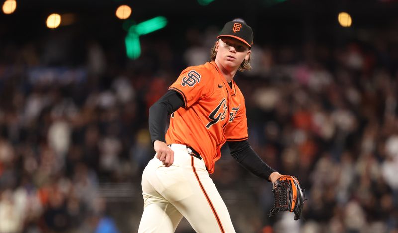 May 2, 2025; San Francisco, California, USA; San Francisco Giants starting pitcher Hayden Birdsong (60) looks over his shoulder after releasing the final pitch against the Colorado Rockies during the ninth inning at Oracle Park. Mandatory Credit: Kelley L Cox-Imagn Images