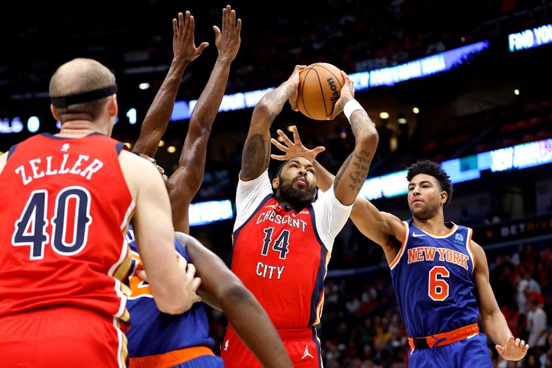 NEW ORLEANS, LOUISIANA - OCTOBER 28: Brandon Ingram #14 of the New Orleans Pelicans shoots over Quentin Grimes #6 of the New York Knicks during the second quarter of an NBA game at Smoothie King Center on October 28, 2023 in New Orleans, Louisiana. NOTE TO USER: User expressly acknowledges and agrees that, by downloading and or using this photograph, User is consenting to the terms and conditions of the Getty Images License Agreement. (Photo by Sean Gardner/Getty Images)