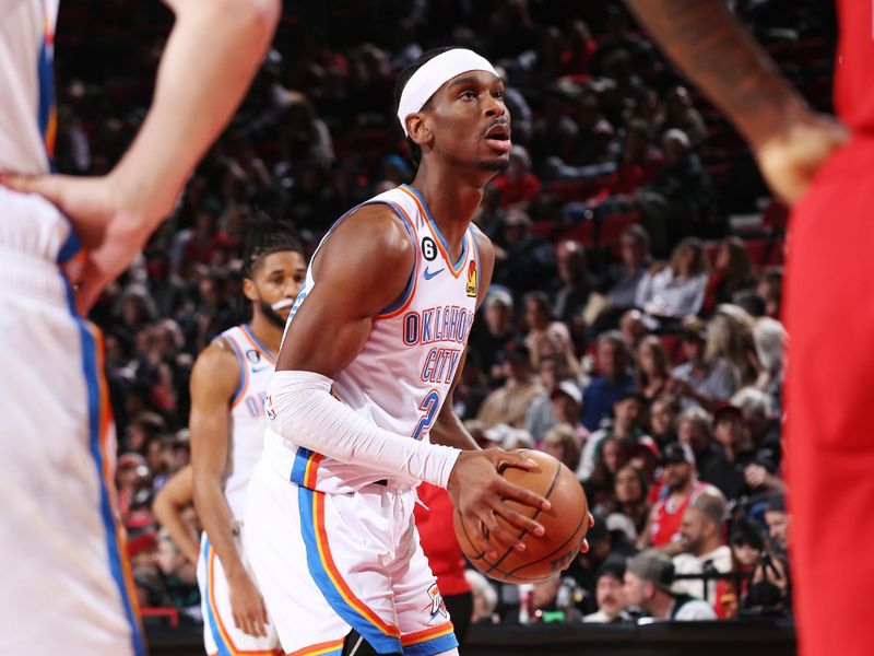 PORTLAND, OR - MARCH 26: Shai Gilgeous-Alexander #2 of the Oklahoma City Thunder shoots a free throw during the game against the Portland Trail Blazers on March 26, 2023 at the Moda Center Arena in Portland, Oregon. NOTE TO USER: User expressly acknowledges and agrees that, by downloading and or using this photograph, user is consenting to the terms and conditions of the Getty Images License Agreement. Mandatory Copyright Notice: Copyright 2023 NBAE (Photo by Cameron Browne/NBAE via Getty Images)