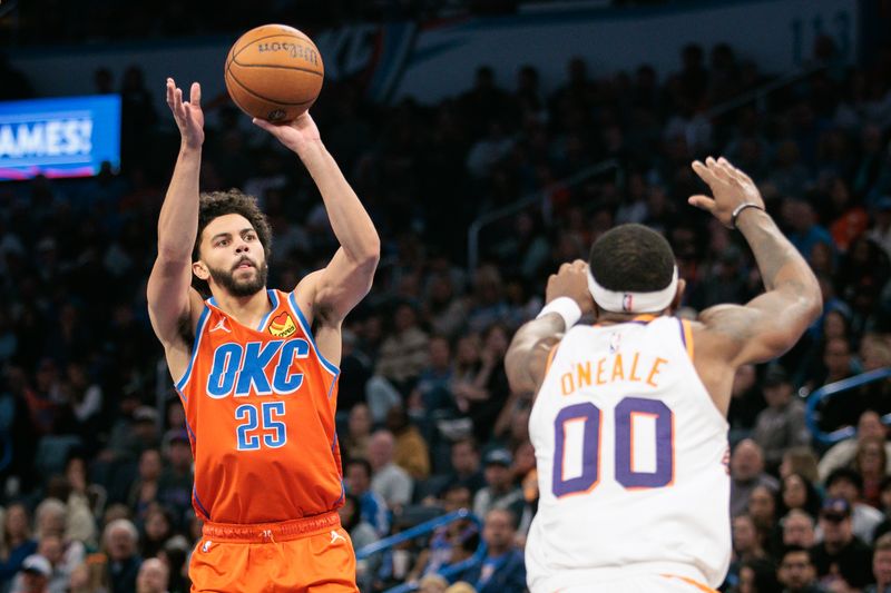 OKLAHOMA CITY, OKLAHOMA - NOVEMBER 15: Ajay Mitchell #25 of the Oklahoma City Thunder shoots the ball over Royce O'Neale #00 of the Phoenix Suns during the third quarter of the Emirates NBA Cup game at Paycom Center on November 15, 2024 in Oklahoma City, Oklahoma. NOTE TO USER: User expressly acknowledges and agrees that, by downloading and or using this photograph, User is consenting to the terms and conditions of the Getty Images License Agreement. (Photo by William Purnell/Getty Images)