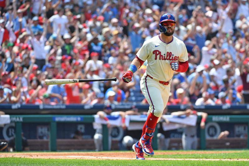 Jul 28, 2024; Philadelphia, Pennsylvania, USA; Philadelphia Phillies designated hitter Kyle Schwarber (12) watches his two-run home run against the Cleveland Guardians during the third inning at Citizens Bank Park. Mandatory Credit: Eric Hartline-USA TODAY Sports