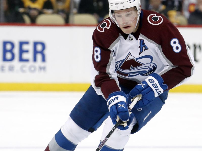 Feb 7, 2023; Pittsburgh, Pennsylvania, USA;  Colorado Avalanche defenseman Cale Makar (8) skates with the puck against the Pittsburgh Penguins in overtime at PPG Paints Arena. The Penguins won 2-1 in overtime. Mandatory Credit: Charles LeClaire-USA TODAY Sports