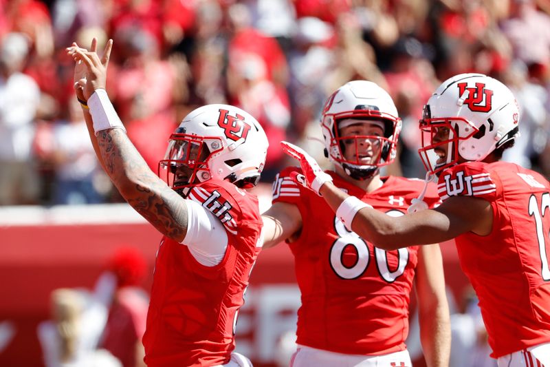 Sep 25, 2021; Salt Lake City, Utah, USA; Utah Utes quarterback Ja'Quinden Jackson (3) reacts after his touchdown in the second quarter against the Washington State Cougars at Rice-Eccles Stadium. Mandatory Credit: Jeffrey Swinger-USA TODAY Sports