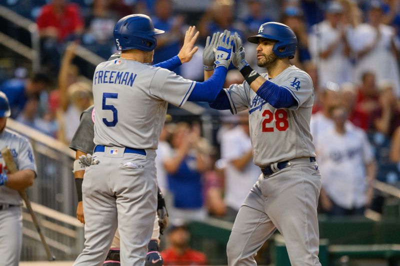 Sep 8, 2023; Washington, District of Columbia, USA; Los Angeles Dodgers designated hitter J.D. Martinez (28) celebrates with first baseman Freddie Freeman (5) after hitting a home run during the first inning at Nationals Park. Mandatory Credit: Reggie Hildred-USA TODAY Sports