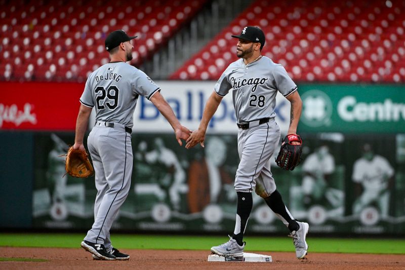 May 4, 2024; St. Louis, Missouri, USA;  Chicago White Sox right fielder Tommy Pham (28) celebrates with shortstop Paul DeJong (29) after the White Sox defeated the St. Louis Cardinals in ten innings at Busch Stadium. Mandatory Credit: Jeff Curry-USA TODAY Sports