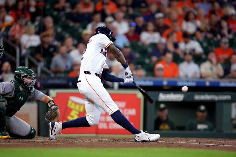 Sep 12, 2024; Houston, Texas, USA; Houston Astros right fielder Jason Heyward (22) hits a two-run home run to right field against the Oakland Athletics during the second inning at Minute Maid Park. Mandatory Credit: Erik Williams-Imagn Images