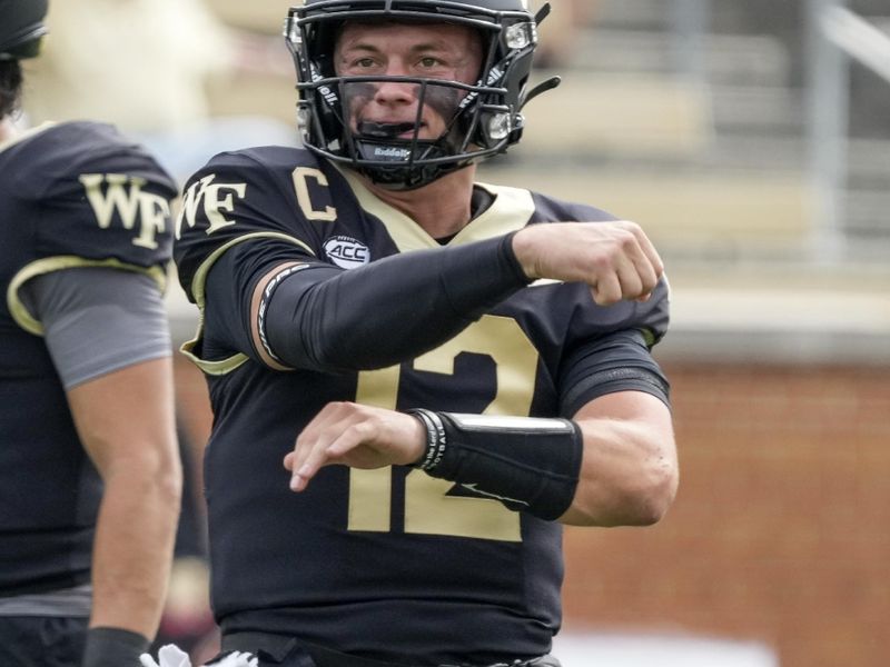 Sep 9, 2023; Winston-Salem, North Carolina, USA; Wake Forest Demon Deacons quarterback Mitch Griffis (12) throws during warm ups against the Vanderbilt Commodores at Allegacy Federal Credit Union Stadium. Mandatory Credit: Jim Dedmon-USA TODAY Sports