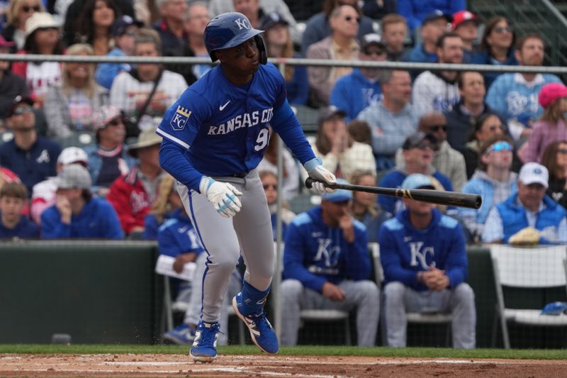 Mar 14, 2025; Tempe, Arizona, USA; Kansas City Royals Tyler Tolbert hits against the Los Angeles Angels in the second inning at Tempe Diablo Stadium. Mandatory Credit: Rick Scuteri-Imagn Images