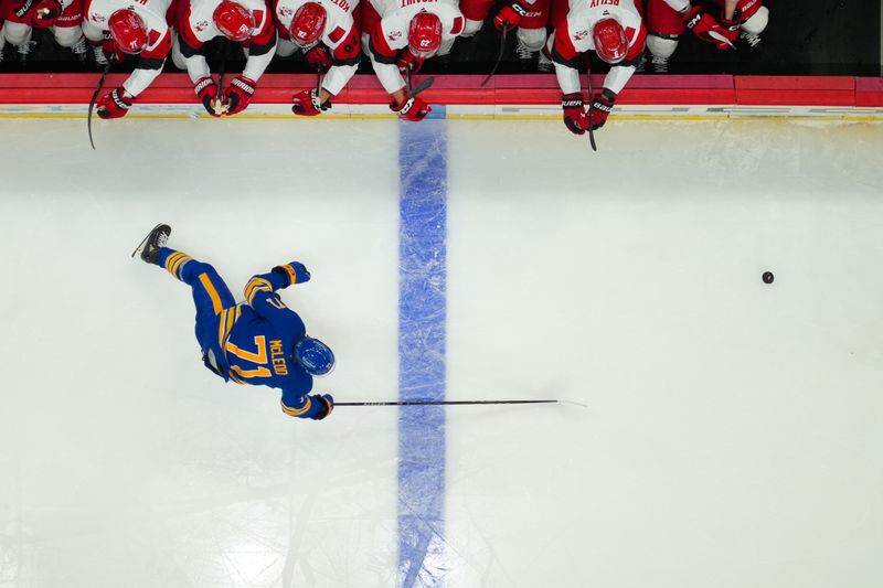 Nov 8, 2025; Raleigh, North Carolina, USA;  Buffalo Sabres center Ryan McLeod (71) skates after the puck against the Carolina Hurricanes during the first period at Lenovo Center. Mandatory Credit: James Guillory-Imagn Images
