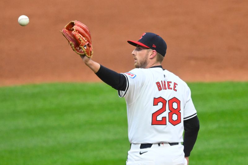 Apr 10, 2024; Cleveland, Ohio, USA; Cleveland Guardians pitcher Tanner Bibee (28) reacts after giving up a home run in the third inning against the Chicago White Sox at Progressive Field. Mandatory Credit: David Richard-USA TODAY Sports