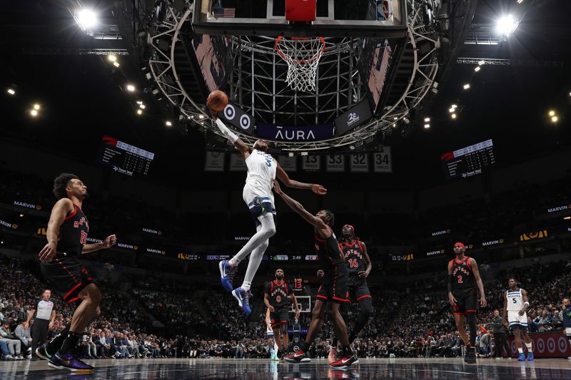 MINNEAPOLIS, MN -  APRIL 3:  Jaden McDaniels #3 of the Minnesota Timberwolves dunks the ball during the game against the Toronto Raptors on April 3, 2024 at Target Center in Minneapolis, Minnesota. NOTE TO USER: User expressly acknowledges and agrees that, by downloading and or using this Photograph, user is consenting to the terms and conditions of the Getty Images License Agreement. Mandatory Copyright Notice: Copyright 2024 NBAE (Photo by Jordan Johnson/NBAE via Getty Images)