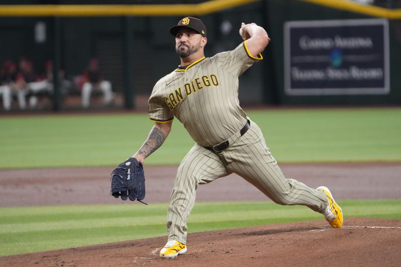 Aug 6, 2025; Phoenix, Arizona, USA; San Diego Padres pitcher Nestor Cortes (65) pitches against the Arizona Diamondbacks during the first inning at Chase Field. Mandatory Credit: Joe Camporeale-Imagn Images
