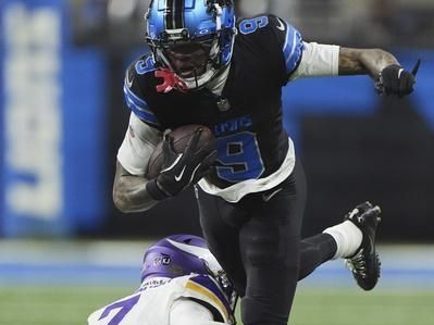 Detroit Lions wide receiver Jameson Williams (9) is upended by Minnesota Vikings cornerback Byron Murphy Jr. (7) after making a catch during the second half of an NFL football game Sunday, Jan. 5, 2025, in Detroit. (AP Photo/Charlie Riedel)