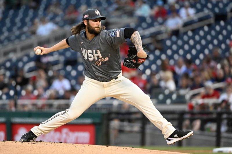 Apr 14, 2023; Washington, District of Columbia, USA; Washington Nationals relief pitcher Trevor Williams (32) throws to the Cleveland Guardians during the first inning at Nationals Park. Mandatory Credit: Brad Mills-USA TODAY Sports