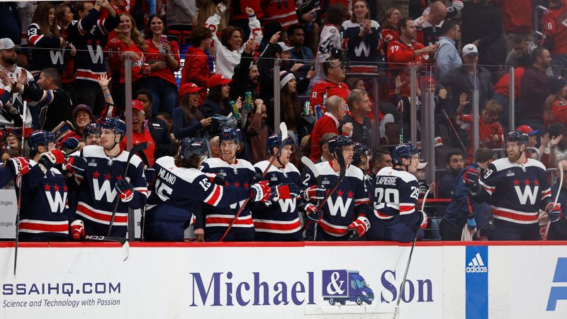 Nov 8, 2023; Washington, District of Columbia, USA; Washington Capitals players celebrate on the bench after a shorthanded goal by Capitals center Connor McMichael (not pictured) against the Florida Panthers in the second period at Capital One Arena. Mandatory Credit: Geoff Burke-USA TODAY Sports