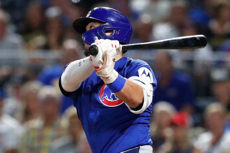 Aug 26, 2024; Pittsburgh, Pennsylvania, USA;  Chicago Cubs designated hitter Seiya Suzuki (27) hits an RBI single against the Pittsburgh Pirates during the sixth inning at PNC Park. Mandatory Credit: Charles LeClaire-USA TODAY Sports