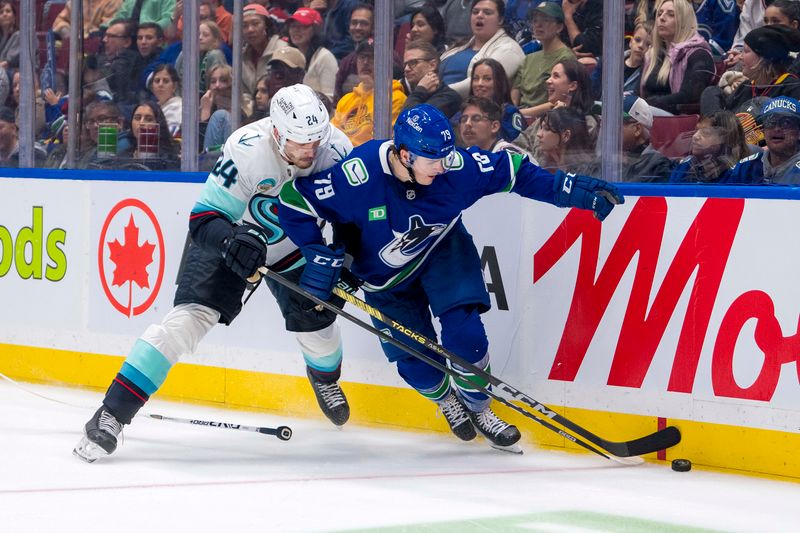 Sep 24, 2024; Vancouver, British Columbia, CAN;  Seattle Kraken defenseman Jamie Oleksiak (24) checks Vancouver Canucsk forward Sammy Blais (79) during the third period at Rogers Arena. Mandatory Credit: Bob Frid-Imagn Images