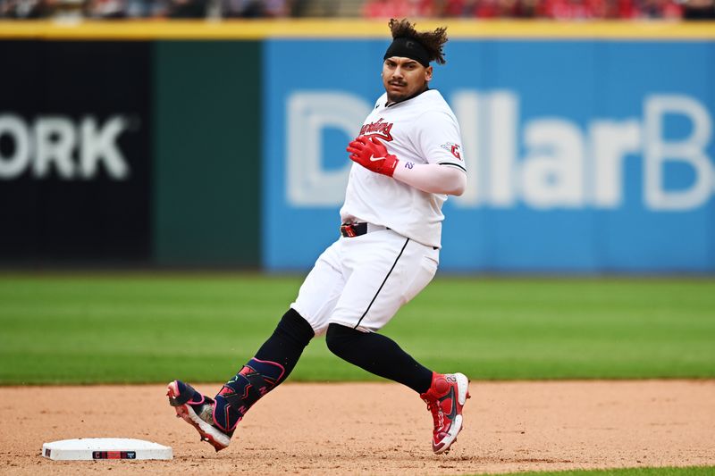 Jul 25, 2024; Cleveland, Ohio, USA; Cleveland Guardians first baseman Josh Naylor (22) hits a double during the seventh inning against the Detroit Tigers at Progressive Field. Mandatory Credit: Ken Blaze-USA TODAY Sports