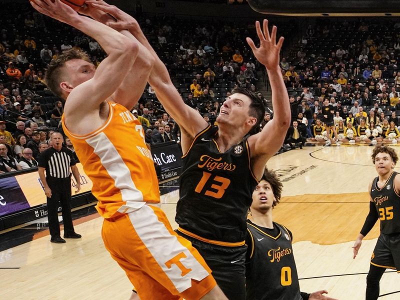 Feb 20, 2024; Columbia, Missouri, USA; Tennessee Volunteers guard Dalton Knecht (3) shoots as Missouri Tigers forward Jesus Carralero Martin (13) defends during the second half at Mizzou Arena. Mandatory Credit: Denny Medley-USA TODAY Sports