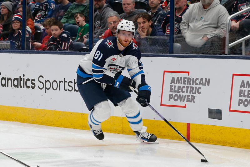 Mar 17, 2024; Columbus, Ohio, USA; Winnipeg Jets left wing Kyle Connor (81) looks to pass against the Columbus Blue Jackets during the third period at Nationwide Arena. Mandatory Credit: Russell LaBounty-USA TODAY Sports