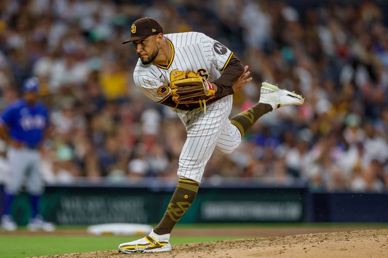 Jul 29, 2023; San Diego, California, USA;  San Diego Padres relief pitcher Robert Suarez (75) throws a pitch during the eighth inning against the Texas Rangers at Petco Park. Mandatory Credit: David Frerker-USA TODAY Sports