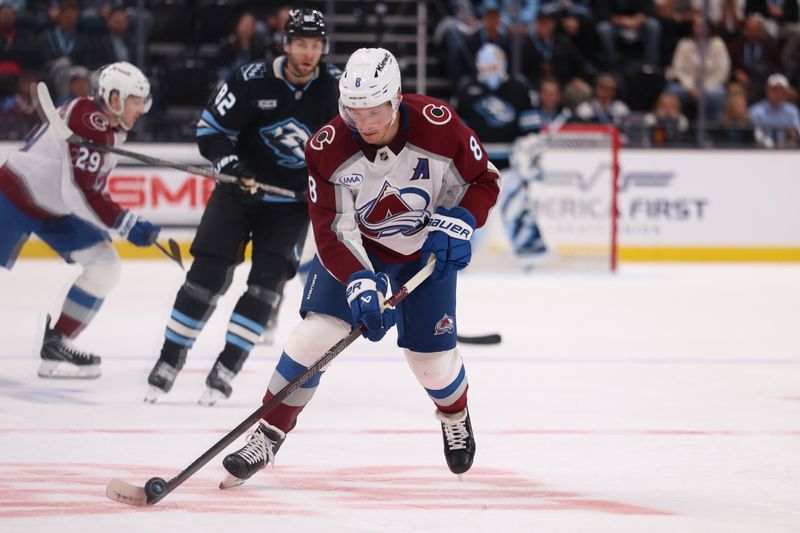 Oct 21, 2025; Salt Lake City, Utah, USA; Colorado Avalanche defenseman Cale Makar (8) controls the puck against the Utah Mammoth during the third period at Delta Center. Mandatory Credit: Rob Gray-Imagn Images