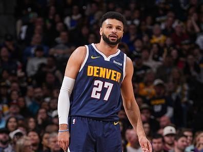 DENVER, CO - JANUARY 1: Jamal Murray #27 of the Denver Nuggets looks on during the game against the Charlotte Hornets on January 1, 2024 at the Ball Arena in Denver, Colorado. NOTE TO USER: User expressly acknowledges and agrees that, by downloading and/or using this Photograph, user is consenting to the terms and conditions of the Getty Images License Agreement. Mandatory Copyright Notice: Copyright 2024 NBAE (Photo by Bart Young/NBAE via Getty Images)