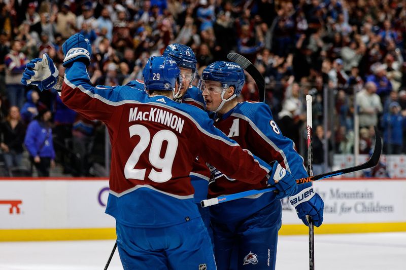 Jan 6, 2024; Denver, Colorado, USA; Colorado Avalanche right wing Valeri Nichushkin (13) celebrates his goal with \defenseman Cale Makar (8) and center Nathan MacKinnon (29) in the second period against the Florida Panthers at Ball Arena. Mandatory Credit: Isaiah J. Downing-USA TODAY Sports