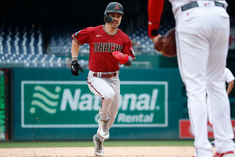 Jun 22, 2023; Washington, District of Columbia, USA; Arizona Diamondbacks left fielder Corbin Carroll (7) rounds third base to score a run during the first inning against the Washington Nationals at Nationals Park. Mandatory Credit: Amber Searls-USA TODAY Sports