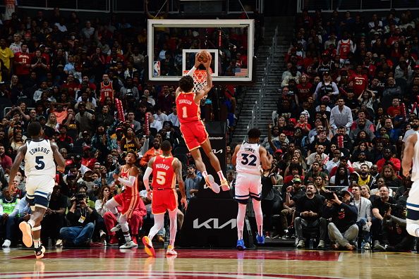 ATLANTA, GA - OCTOBER 30: Jalen Johnson #1 of the Atlanta Hawks dunks the ball during the game against the Minnesota Timberwolves on October 30, 2023 at State Farm Arena in Atlanta, Georgia.  NOTE TO USER: User expressly acknowledges and agrees that, by downloading and/or using this Photograph, user is consenting to the terms and conditions of the Getty Images License Agreement. Mandatory Copyright Notice: Copyright 2023 NBAE (Photo by Scott Cunningham/NBAE via Getty Images)