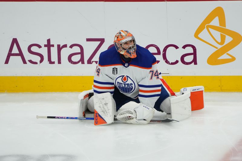 Jun 24, 2024; Sunrise, Florida, USA; Edmonton Oilers goaltender Skinner Stuart (74) warms up prior to the game against the Florida Panthers in game seven of the 2024 Stanley Cup Final at Amerant Bank Arena. Mandatory Credit: Jim Rassol-USA TODAY Sports