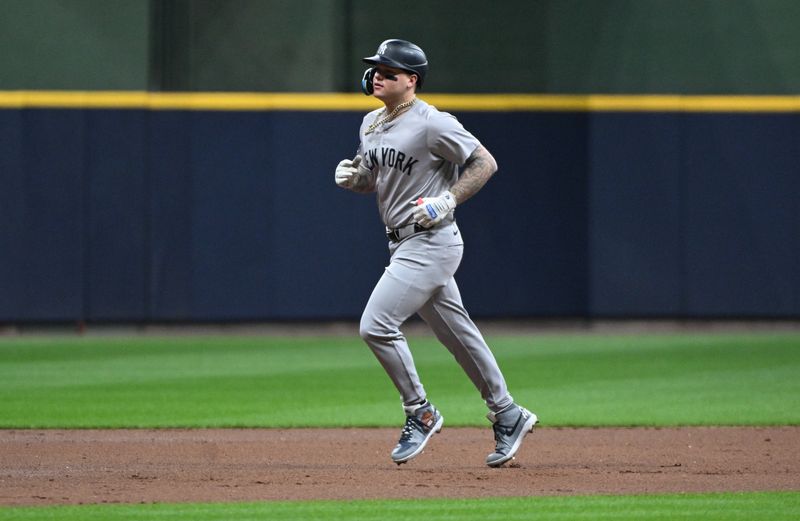 Apr 26, 2024; Milwaukee, Wisconsin, USA; New York Yankees outfielder Alex Verdugo (24) rounds the bases after hitting a home run against the Milwaukee Brewers in the second inning at American Family Field. Mandatory Credit: Michael McLoone-USA TODAY Sports