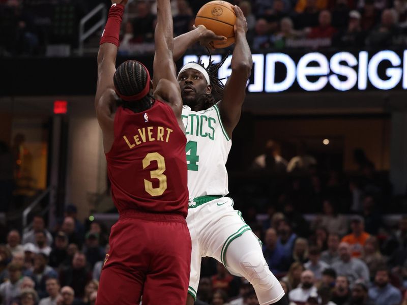 CLEVELAND, OH - DECEMBER 1: Jrue Holiday #4 of the Boston Celtics shoots the ball during the game against the Cleveland Cavaliers on December 1, 2024 at Rocket Mortgage FieldHouse in Cleveland, Ohio. NOTE TO USER: User expressly acknowledges and agrees that, by downloading and/or using this Photograph, user is consenting to the terms and conditions of the Getty Images License Agreement. Mandatory Copyright Notice: Copyright 2024 NBAE (Photo by  Lauren Leigh Bacho/NBAE via Getty Images)