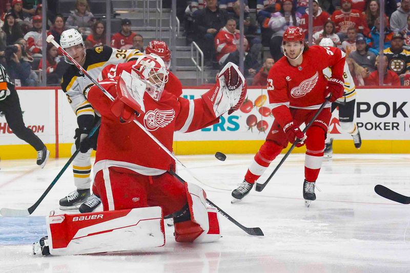 Nov 23, 2024; Detroit, Michigan, USA; Detroit Red Wings goaltender Cam Talbot (39) makes a save during the first period of the game against the Boston Bruins at Little Caesars Arena. Mandatory Credit: Brian Bradshaw Sevald-Imagn Images