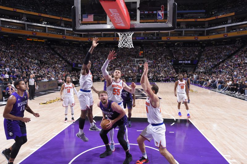 SACRAMENTO, CA - MARCH 16: Domantas Sabonis #10 of the Sacramento Kings drives to the basket during the game against the New York Knicks on March 16, 2024 at Golden 1 Center in Sacramento, California. NOTE TO USER: User expressly acknowledges and agrees that, by downloading and or using this Photograph, user is consenting to the terms and conditions of the Getty Images License Agreement. Mandatory Copyright Notice: Copyright 2024 NBAE (Photo by Rocky Widner/NBAE via Getty Images)