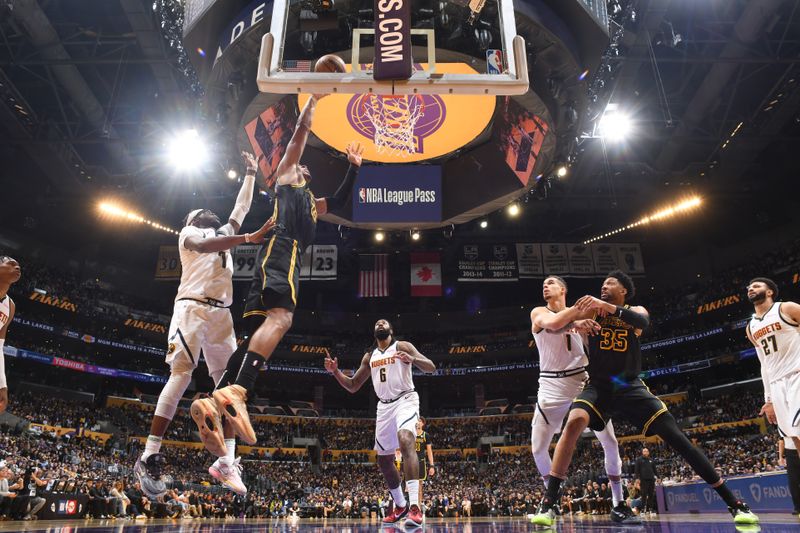 LOS ANGELES, CA - FEBRUARY 8: Rui Hachimura #28 of the Los Angeles Lakers drives to the basket during the game against the Denver Nuggets on Feburary 8, 2024 at Crypto.Com Arena in Los Angeles, California. NOTE TO USER: User expressly acknowledges and agrees that, by downloading and/or using this Photograph, user is consenting to the terms and conditions of the Getty Images License Agreement. Mandatory Copyright Notice: Copyright 2024 NBAE (Photo by Andrew D. Bernstein/NBAE via Getty Images)