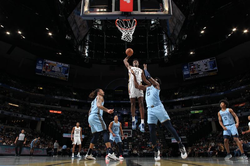 MEMPHIS, TN - NOVEMBER 29: Yves Missi #21 of the New Orleans Pelicans dunks the ball during the game against the Memphis Grizzlies during the Emirates NBA Cup game on November 29, 2024 at FedExForum in Memphis, Tennessee. NOTE TO USER: User expressly acknowledges and agrees that, by downloading and or using this photograph, User is consenting to the terms and conditions of the Getty Images License Agreement. Mandatory Copyright Notice: Copyright 2024 NBAE (Photo by Joe Murphy/NBAE via Getty Images)