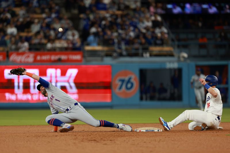 Apr 19, 2024; Los Angeles, California, USA;  Los Angeles Dodgers catcher Will Smith (16) is safe at second as New York Mets second base Jeff McNeil (1) miss to catch a throw from third base Joey Wendle (13, not pictured) during the sixth inning at Dodger Stadium. Mandatory Credit: Kiyoshi Mio-USA TODAY Sports