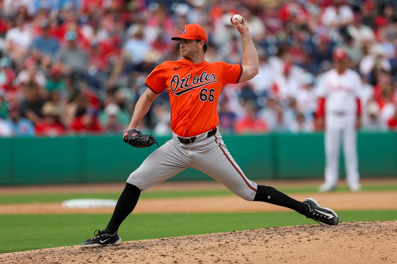 Mar 5, 2024; Clearwater, Florida, USA;  Baltimore Orioles relief pitcher Matt Krook (66) throws a pitch against the Philadelphia Phillies in the sixth inning at BayCare Ballpark. Mandatory Credit: Nathan Ray Seebeck-USA TODAY Sports