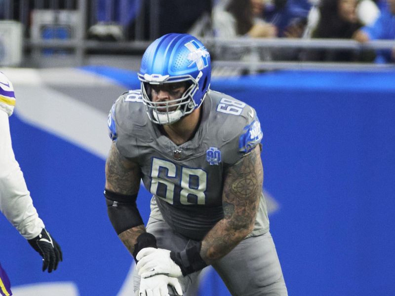 Detroit Lions offensive tackle Taylor Decker (68) blocks against the Minnesota Vikings during an NFL football game at Ford Field in Detroit, Sunday, Jan. 7, 2024. (AP Photo/Rick Osentoski)