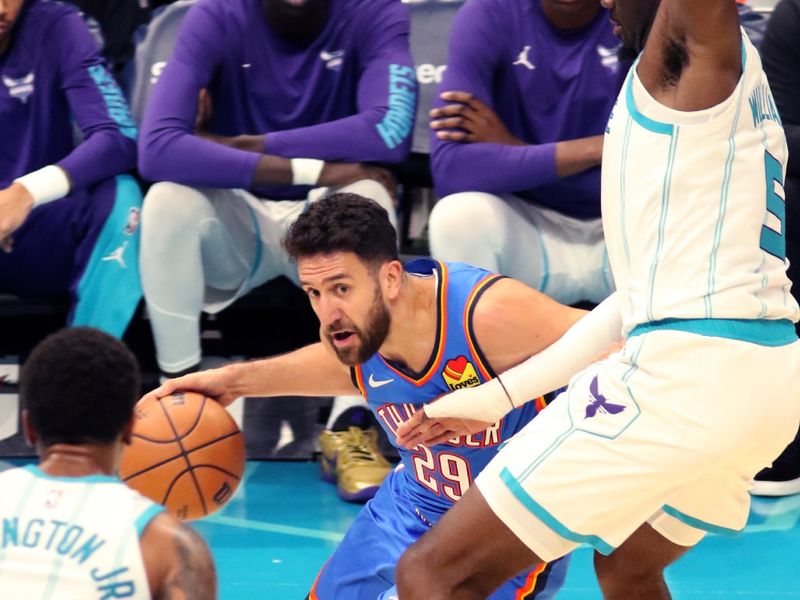 CHARLOTTE, NC - OCTOBER 15: Vasilije Micic #29 of the Oklahoma City Thunder dribbles the ball during the game against the Charlotte Hornets on October 15, 2023 at Spectrum Center in Charlotte, North Carolina. NOTE TO USER: User expressly acknowledges and agrees that, by downloading and or using this photograph, User is consenting to the terms and conditions of the Getty Images License Agreement.  Mandatory Copyright Notice:  Copyright 2023 NBAE (Photo by Brock Williams-Smith/NBAE via Getty Images)