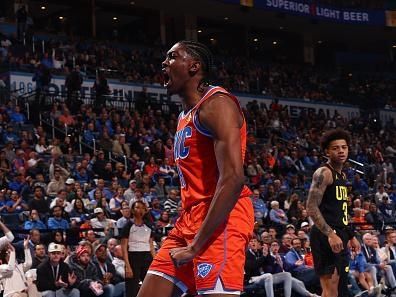 OKLAHOMA CITY, OK - DECEMBER 11: Jalen Williams #8 of the Oklahoma City Thunder celebrates during the game against the Utah Jazz on December 11, 2023 at Paycom Arena in Oklahoma City, Oklahoma. NOTE TO USER: User expressly acknowledges and agrees that, by downloading and or using this photograph, User is consenting to the terms and conditions of the Getty Images License Agreement. Mandatory Copyright Notice: Copyright 2023 NBAE (Photo by Zach Beeker/NBAE via Getty Images)