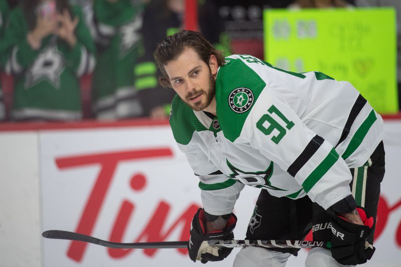 Oct 24, 2022; Ottawa, Ontario, CAN; Dallas Stars center Tyler Seguin (91) looks on during warm ups prior to the start of a game against the Ottawa Senators at the Canadian Tire Centre. Mandatory Credit: Marc DesRosiers-USA TODAY Sports