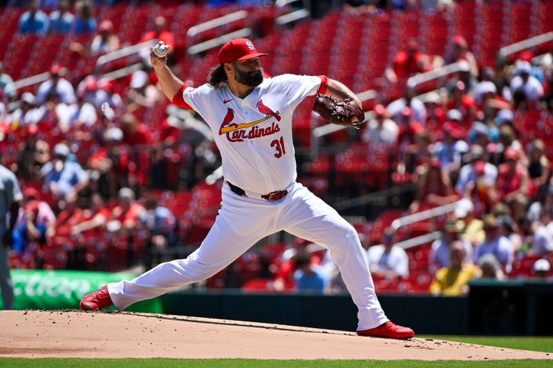 Jun 13, 2024; St. Louis, Missouri, USA;  St. Louis Cardinals starting pitcher Lance Lynn (31) pitches against the Pittsburgh Pirates during the first inning at Busch Stadium. Mandatory Credit: Jeff Curry-USA TODAY Sports