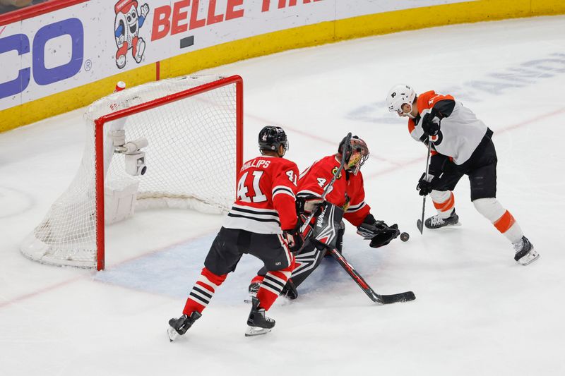 Feb 21, 2024; Chicago, Illinois, USA; Philadelphia Flyers right wing Garnet Hathaway (19) shoots and scores against the Chicago Blackhawks during the second period at United Center. Mandatory Credit: Kamil Krzaczynski-USA TODAY Sports