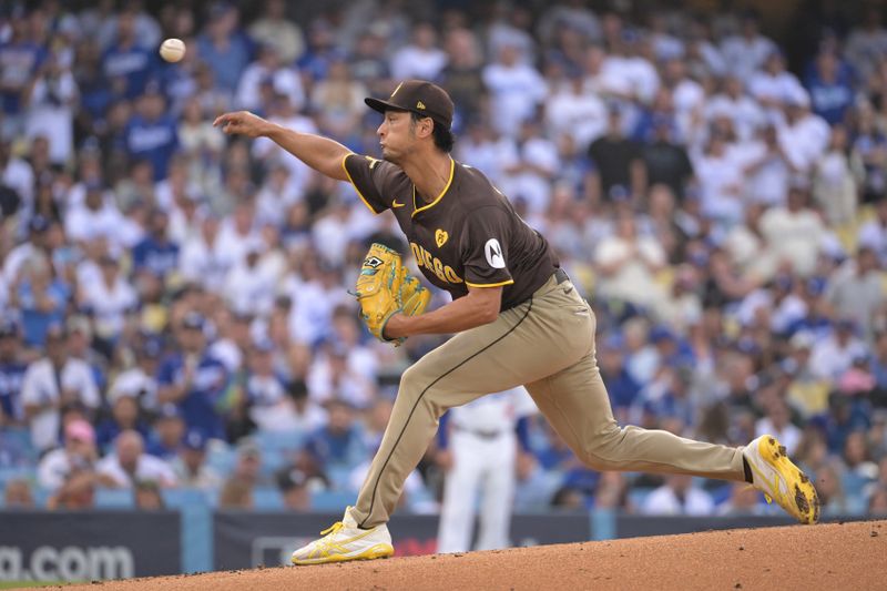 Oct 11, 2024; Los Angeles, California, USA; San Diego Padres pitcher Yu Darvish (11) pitches in the first inning against the Los Angeles Dodgers during game five of the NLDS for the 2024 MLB Playoffs at Dodger Stadium. Mandatory Credit: Jayne Kamin-Oncea-Imagn Images