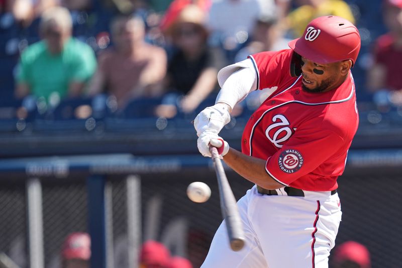 Feb 26, 2023; West Palm Beach, Florida, USA;  Washington Nationals first baseman Dominic Smith (22) pops out to third base in the third inning against the Houston Astros at The Ballpark of the Palm Beaches. Mandatory Credit: Jim Rassol-USA TODAY Sports