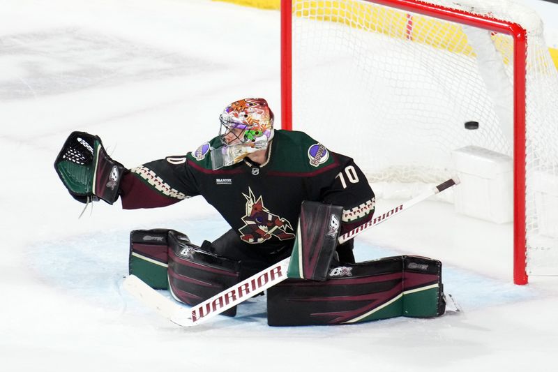 Oct 27, 2023; Tempe, Arizona, USA; Arizona Coyotes goaltender Karel Vejmelka (70) allows a goal to Los Angeles Kings defenseman Drew Doughty (not pictured) during the third period at Mullett Arena. Mandatory Credit: Joe Camporeale-USA TODAY Sports